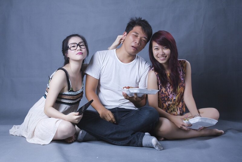 Three people eating together