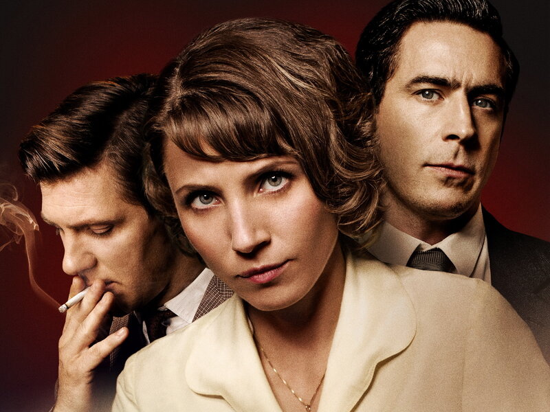 Three people in a dramatic portrait