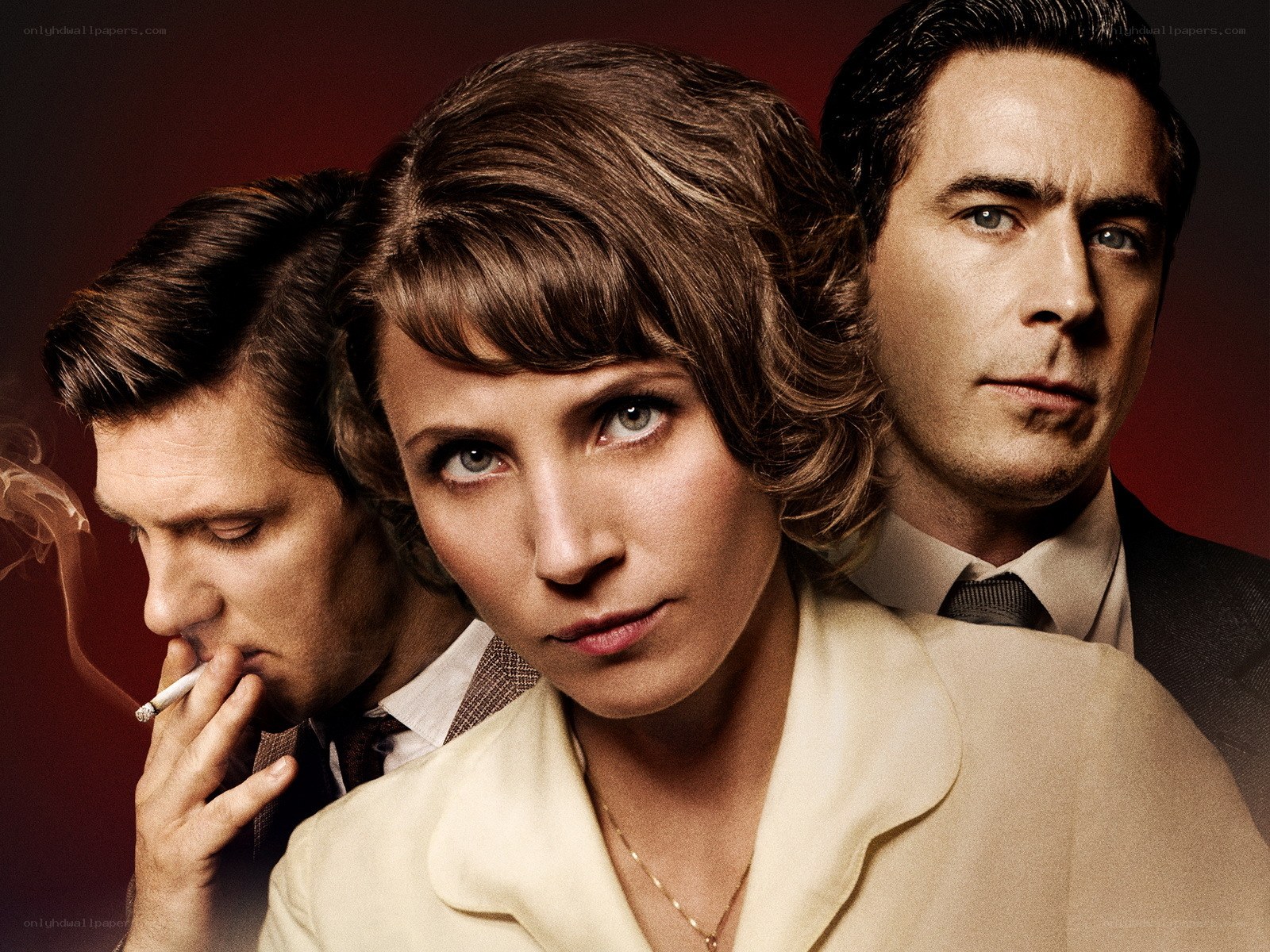 Three people in a dramatic portrait