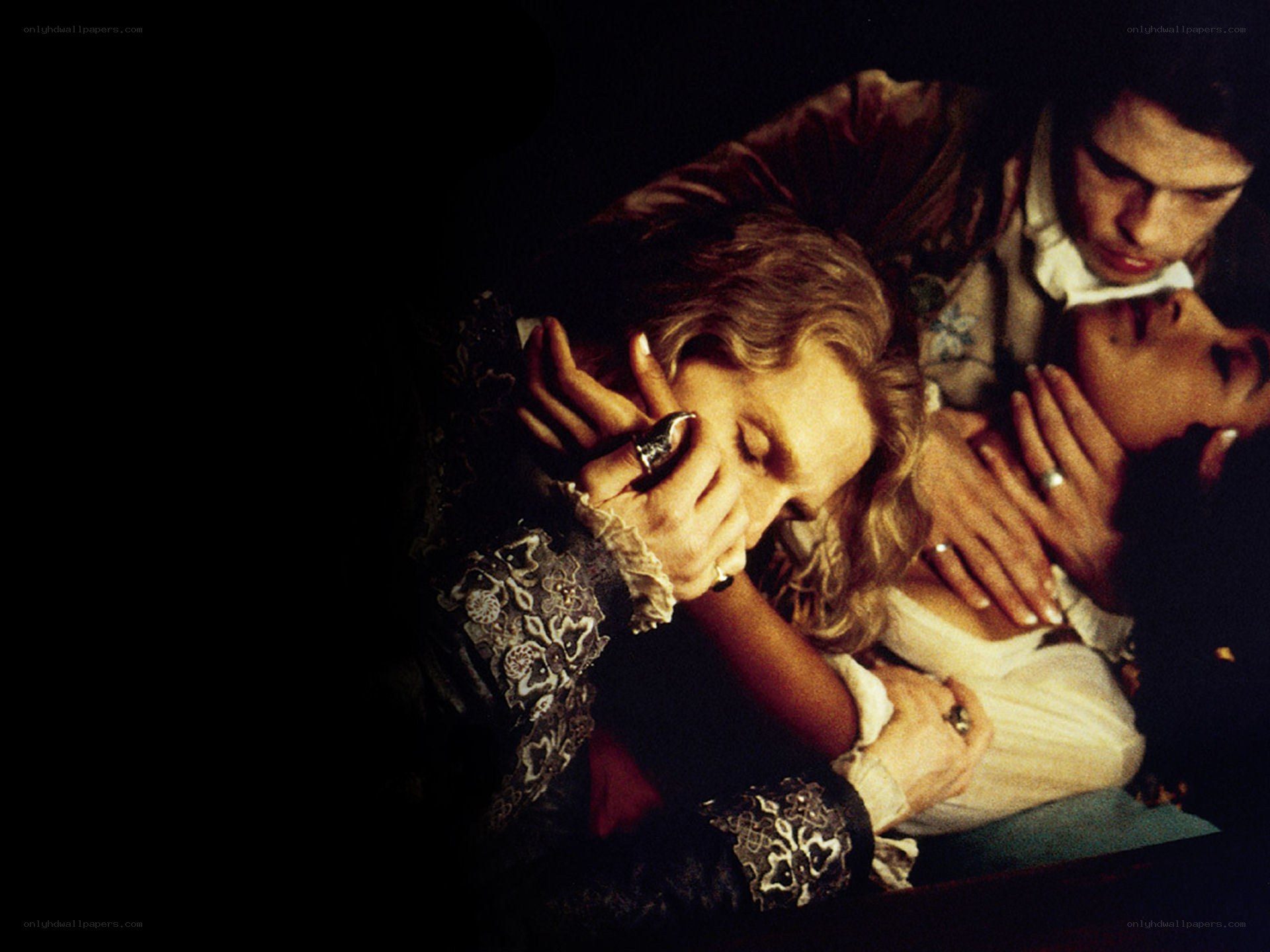 Three people in a dramatic scene