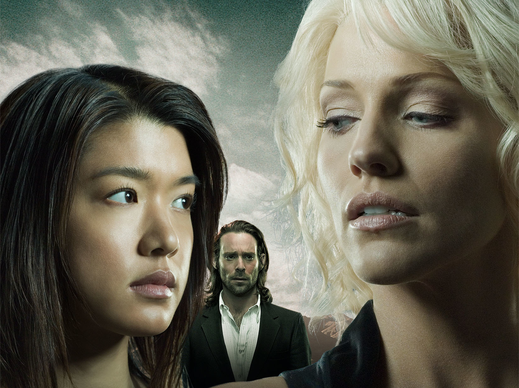 Three people in a dramatic scene