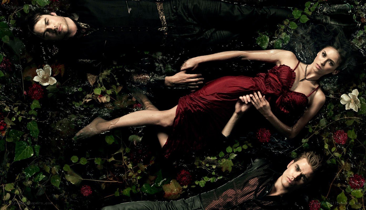 Three people in a floral pool