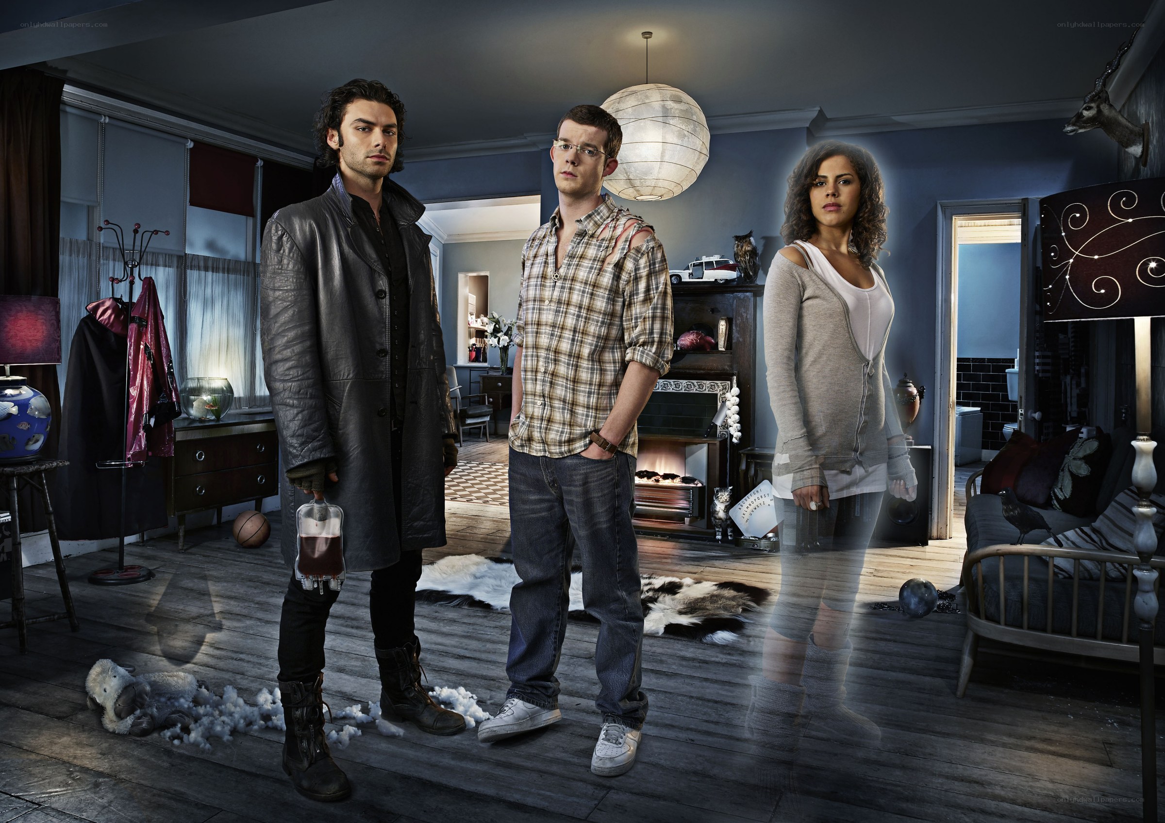 Three people in a living room