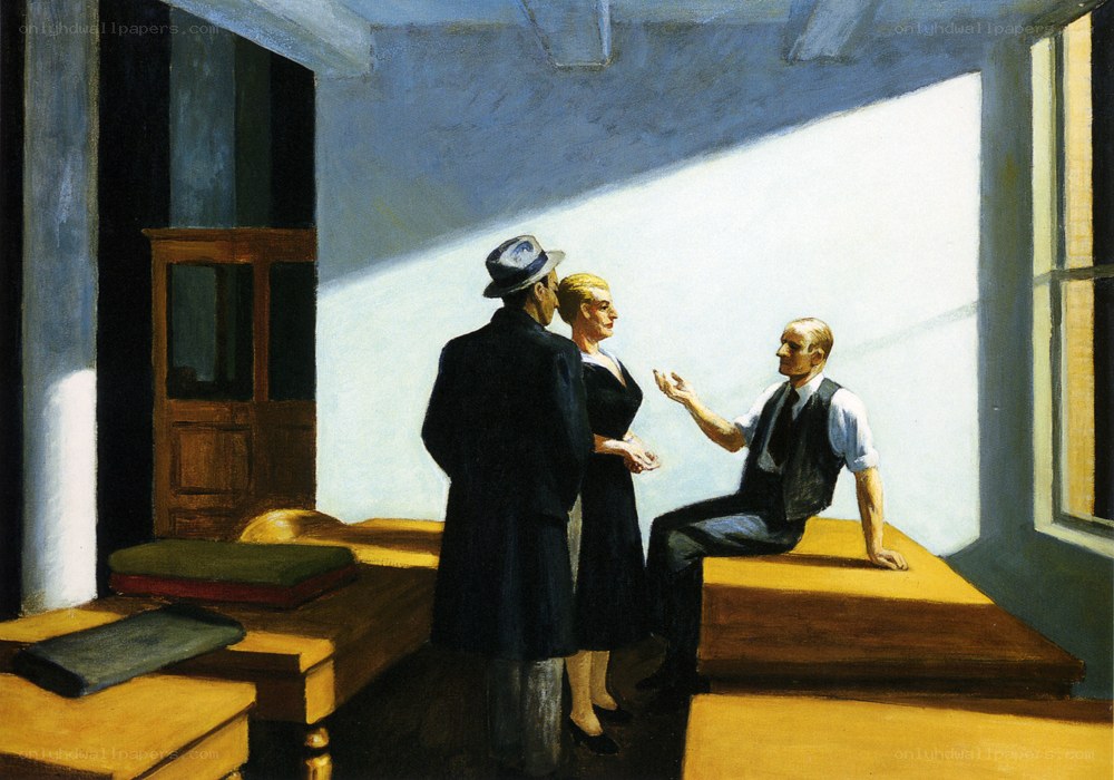 Three people in a room with sunlight