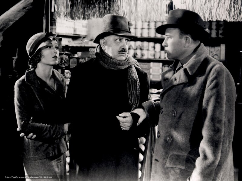 Three people in a shop scene