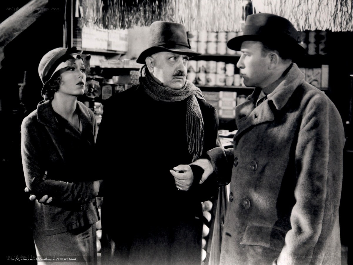 Three people in a shop scene