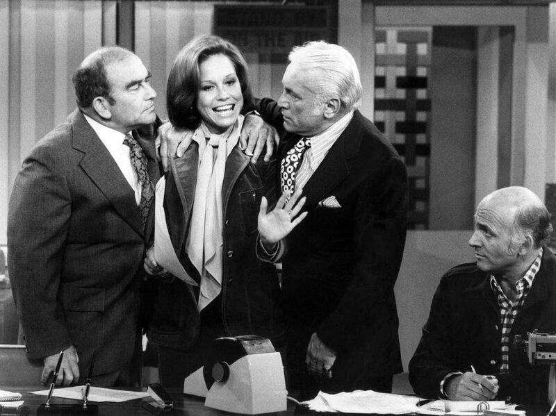 Three People in a Studio