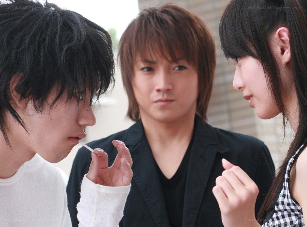Three people in a tense moment