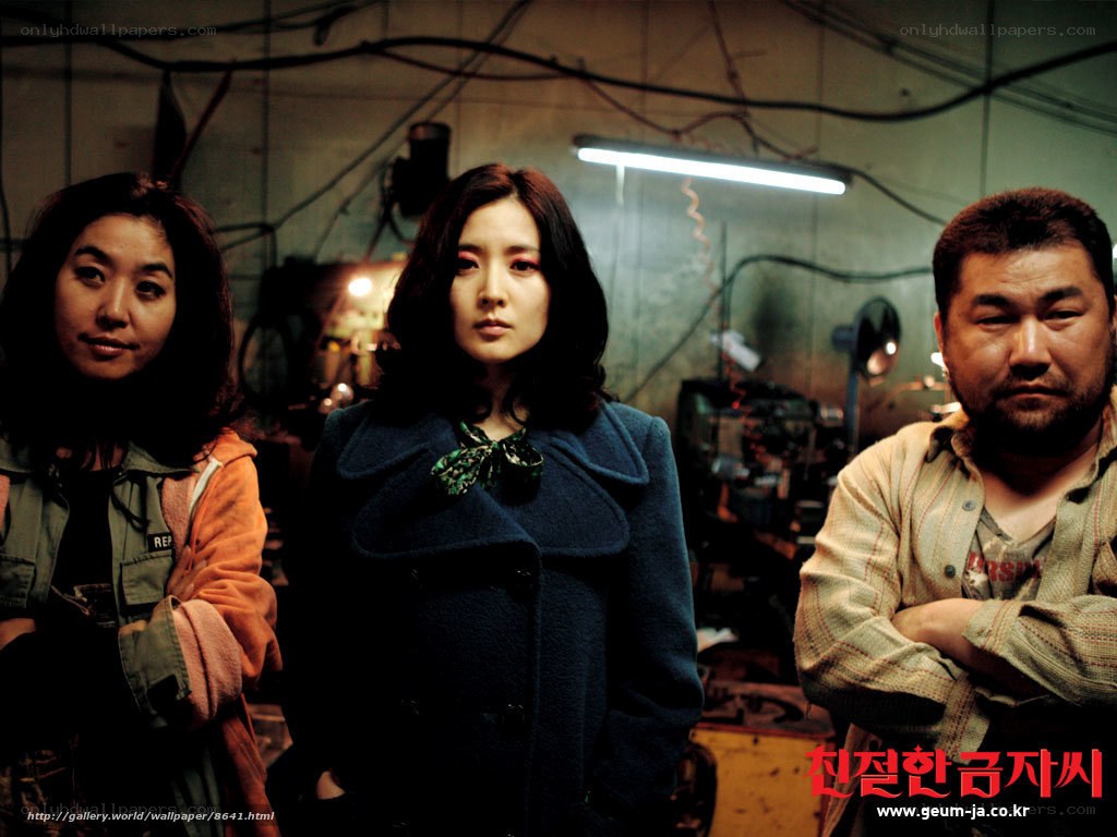 three people in a workshop