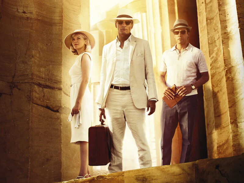 Three People in Ancient Ruins