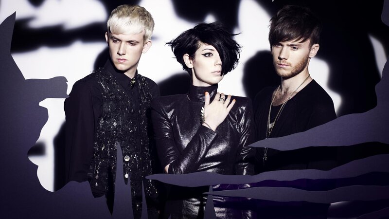Three People in Black Clothing — Dramatic, Photograph