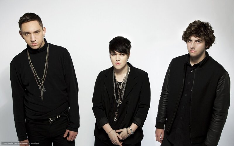 Three People in Black Clothing — Serious