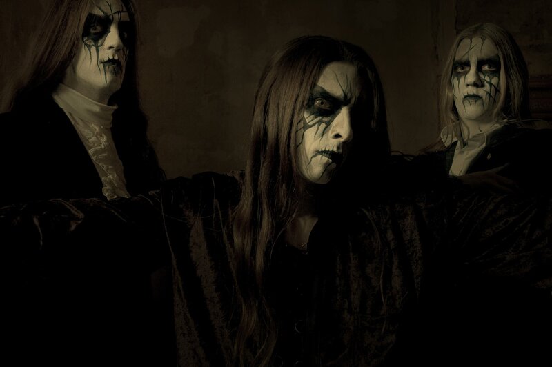 Three People in Dark Makeup