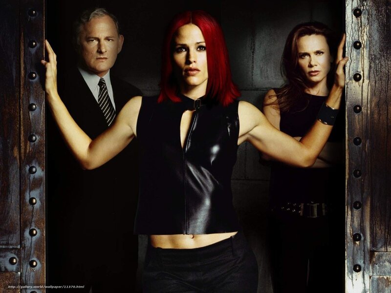 Three people in dark setting
