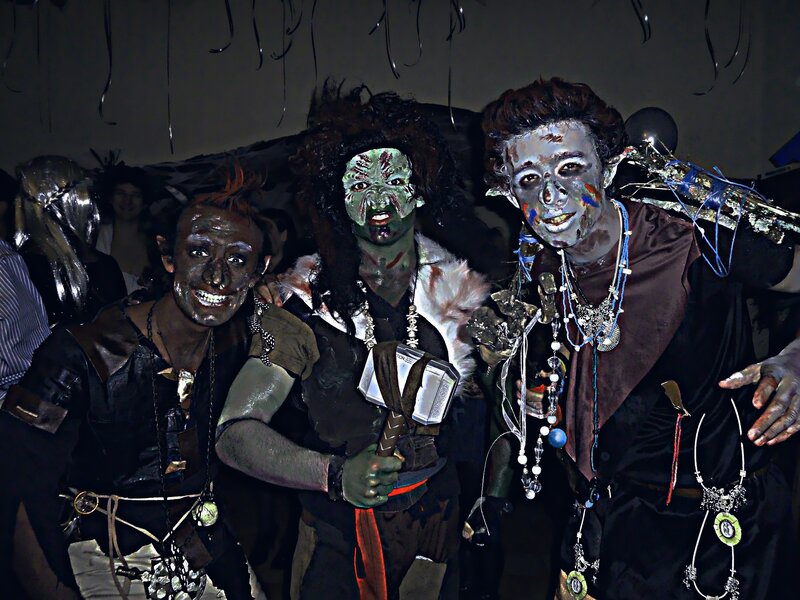 Three people in fantasy costumes