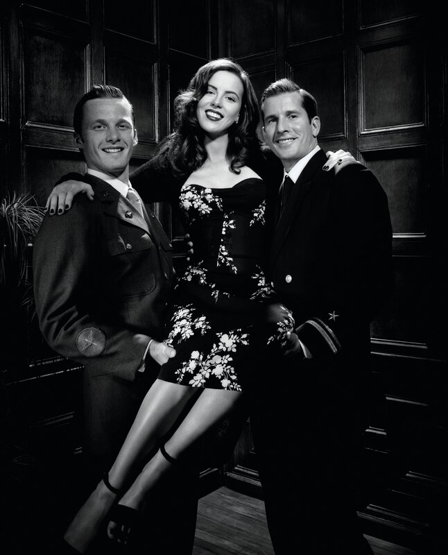 Three people in formal attire