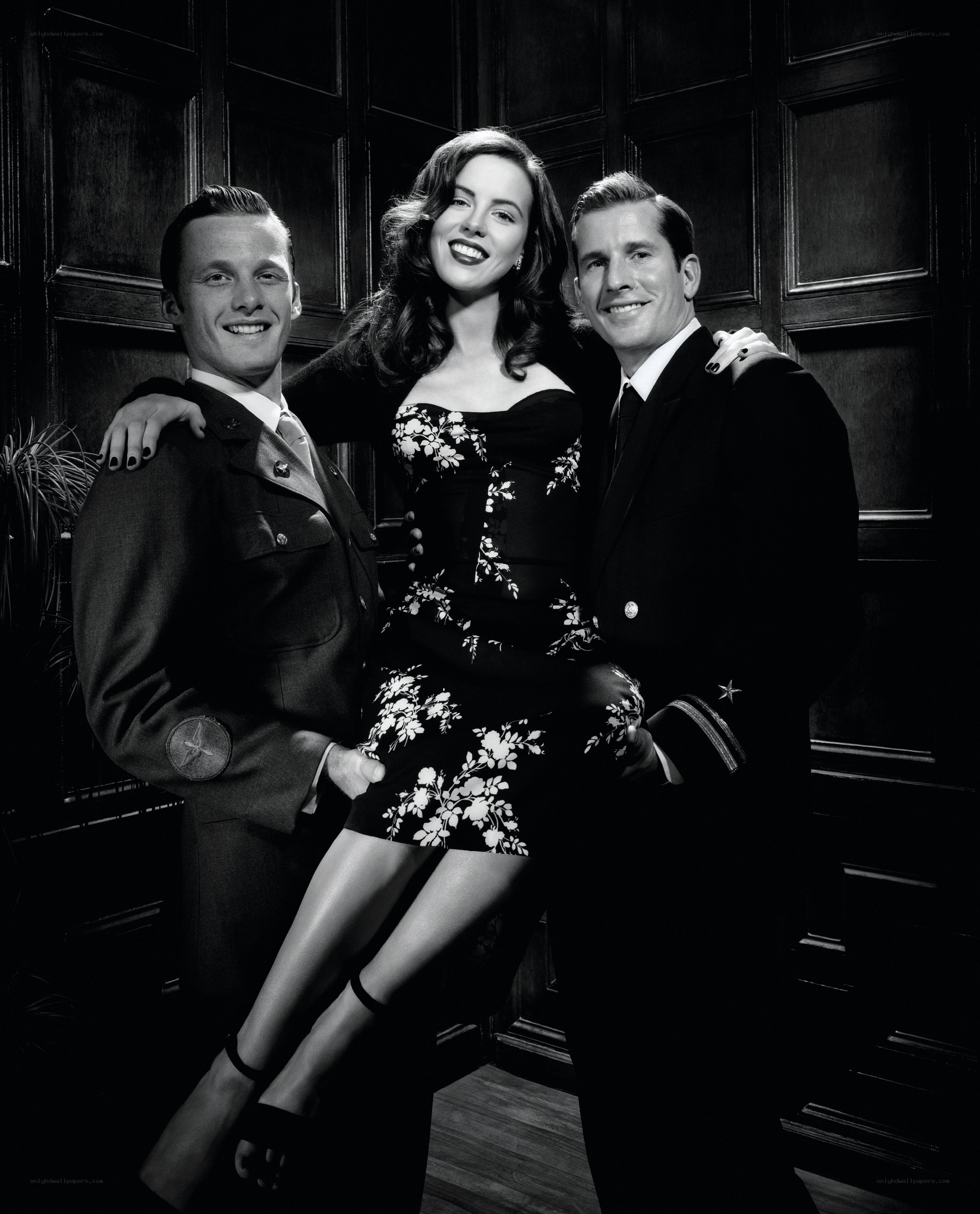 Three people in formal attire