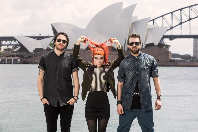 Three People in Front of Opera House