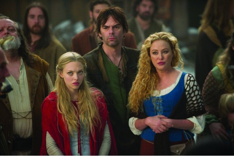 Three People in Medieval Clothing