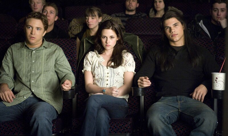 Three People in Movie Theater
