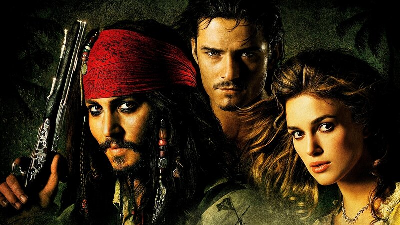 Three People in Pirate Attire