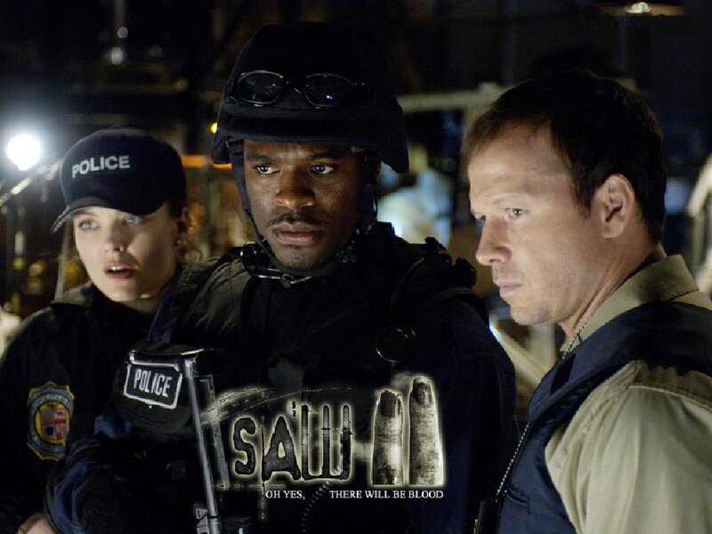 Three People in Tactical Gear