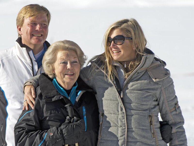 Three People in Winter Clothes
