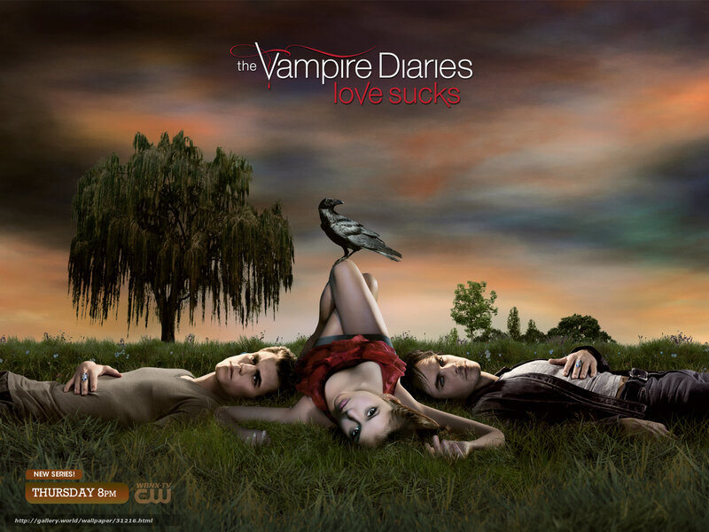 Three People Lying in Grass