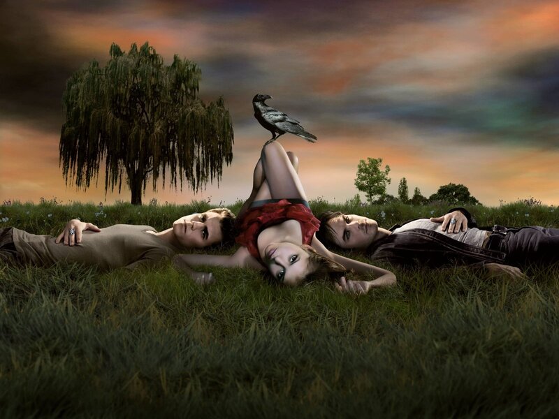 Three People Lying on Grass — Green