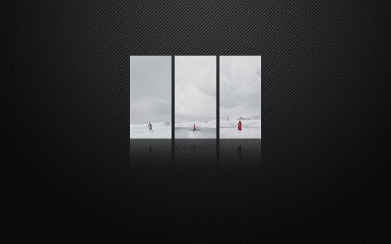 Three people on a beach