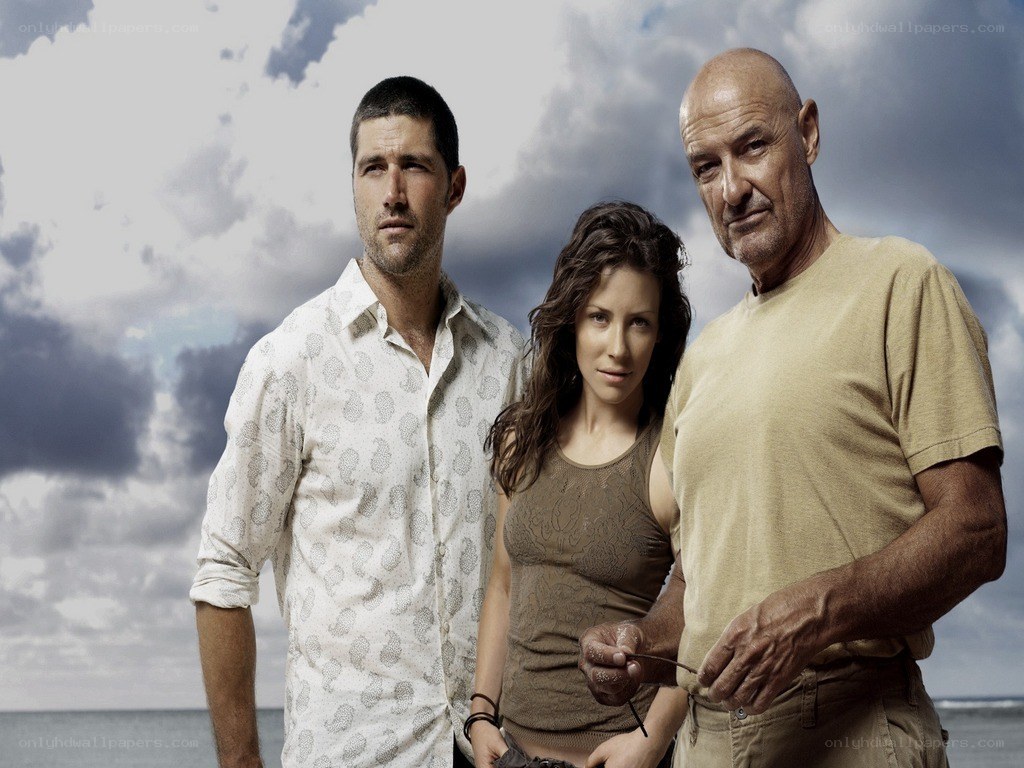 three people on a beach