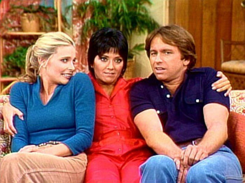 Three People on a Couch — Red