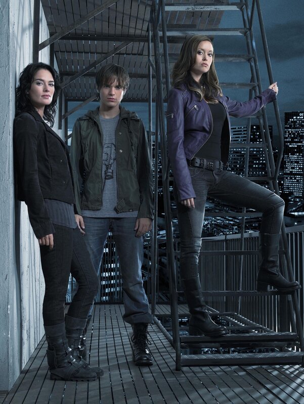 three people on a rooftop