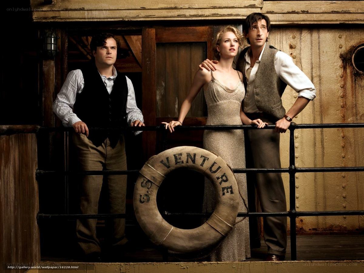 Three people on a ship deck
