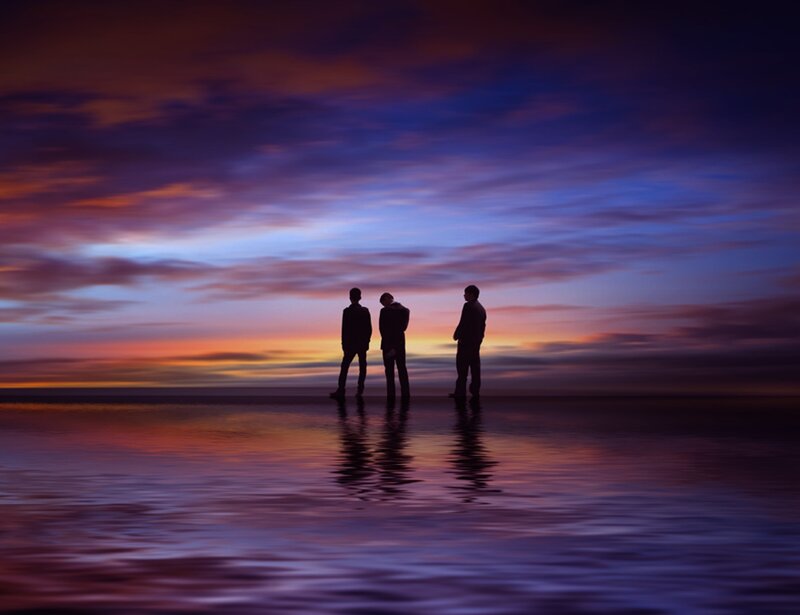 Three People on Beach — Purple