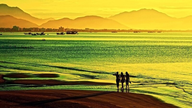 Three People on Beach — Yellow, Serene