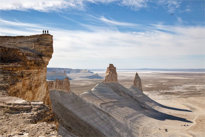 Three People on Cliff