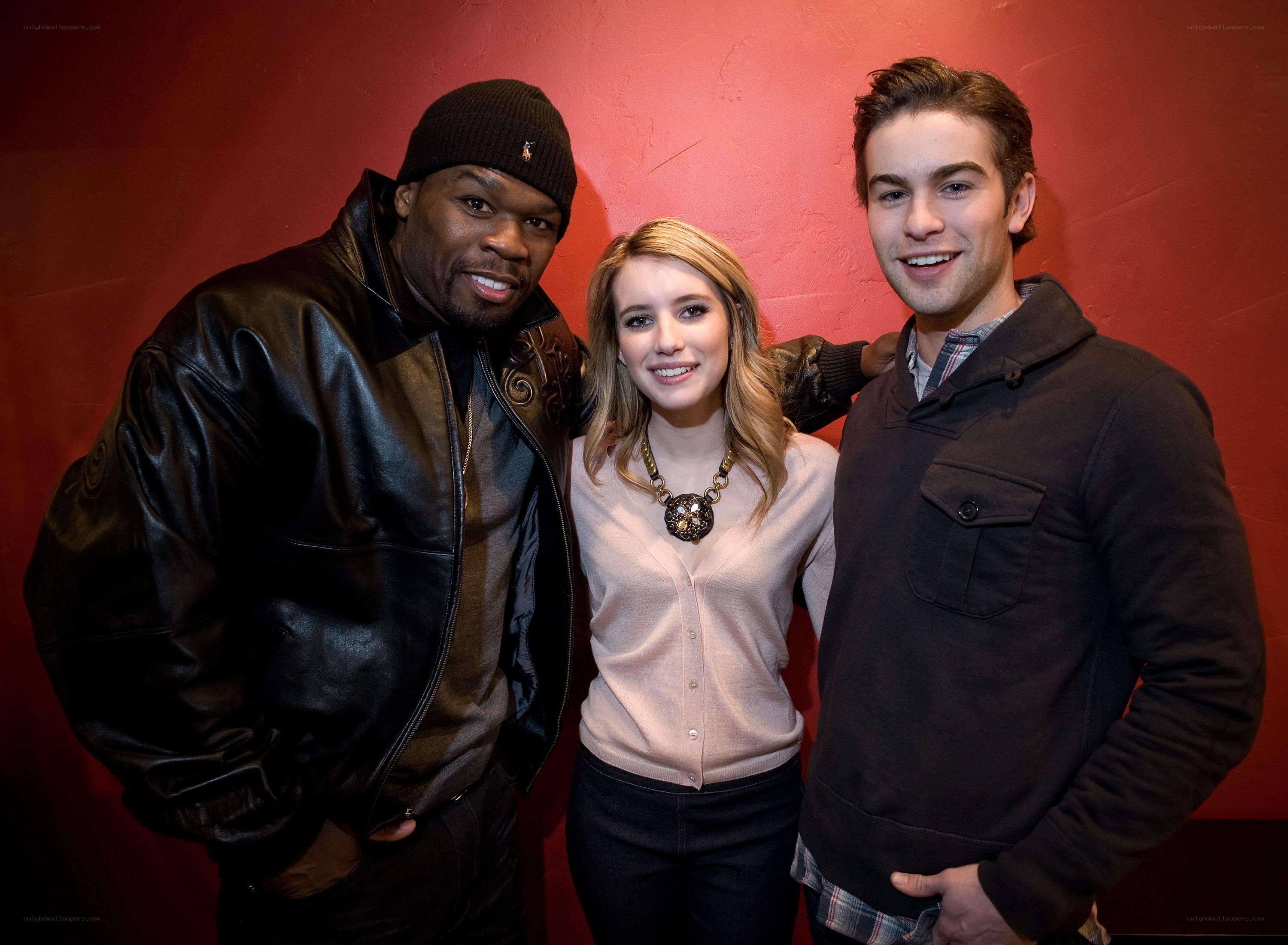 Three people posing for a photo