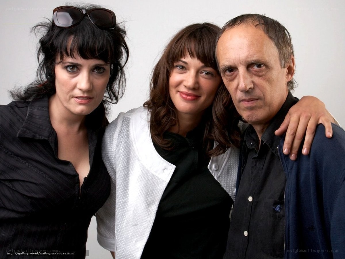 three people posing together