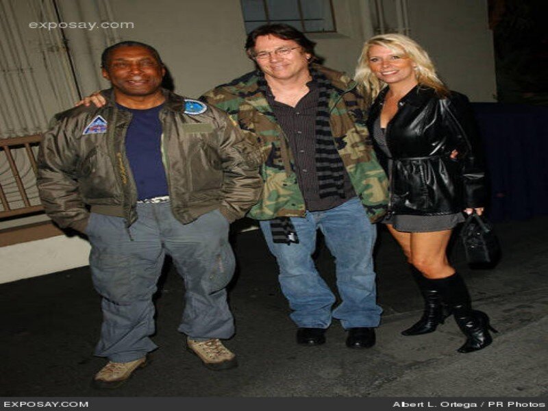 Three People Posing Together — Black, Casual