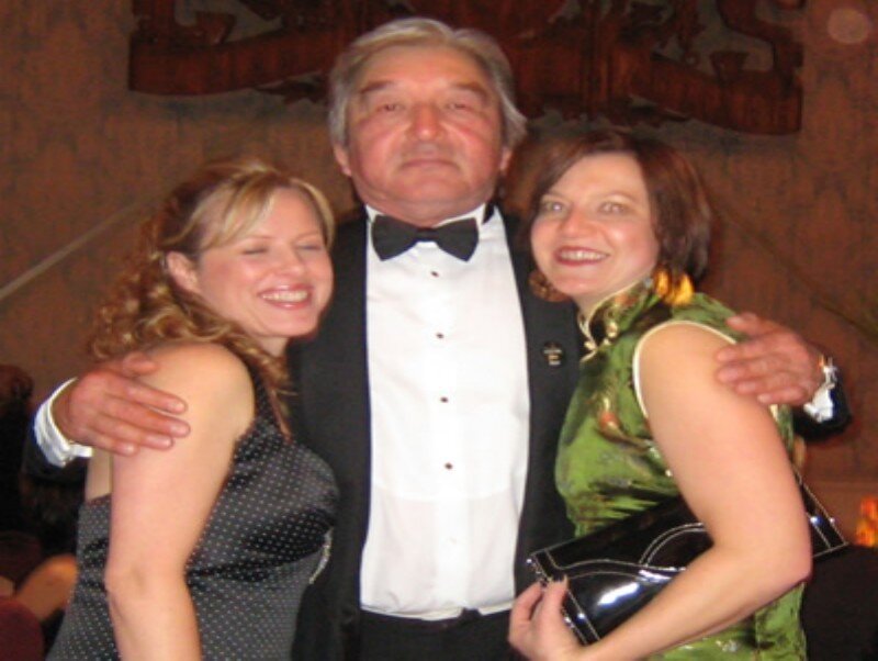 Three People Posing Together — Black, Formal