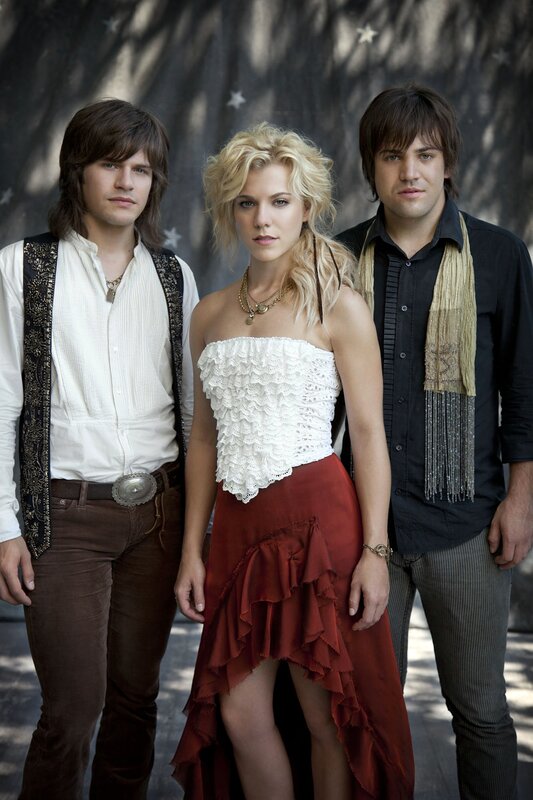 Three People Posing — White, Serious