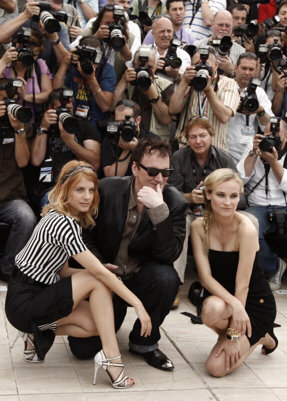 Three People Posing with Photographers
