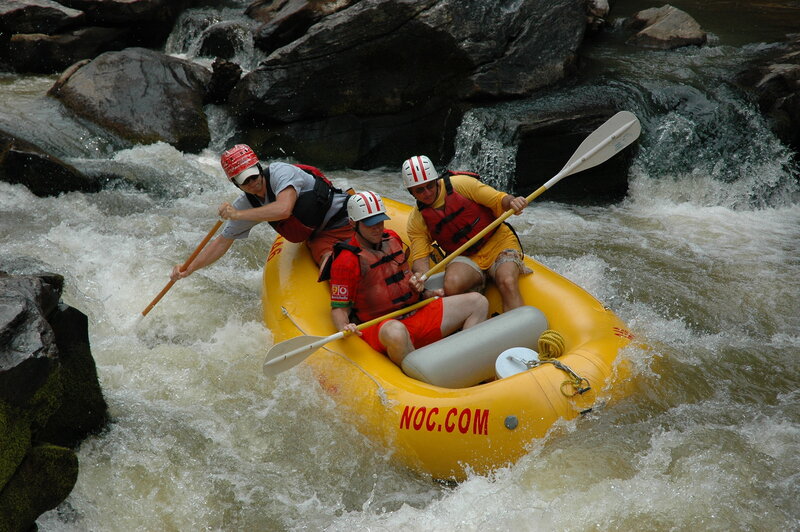Three People Rafting