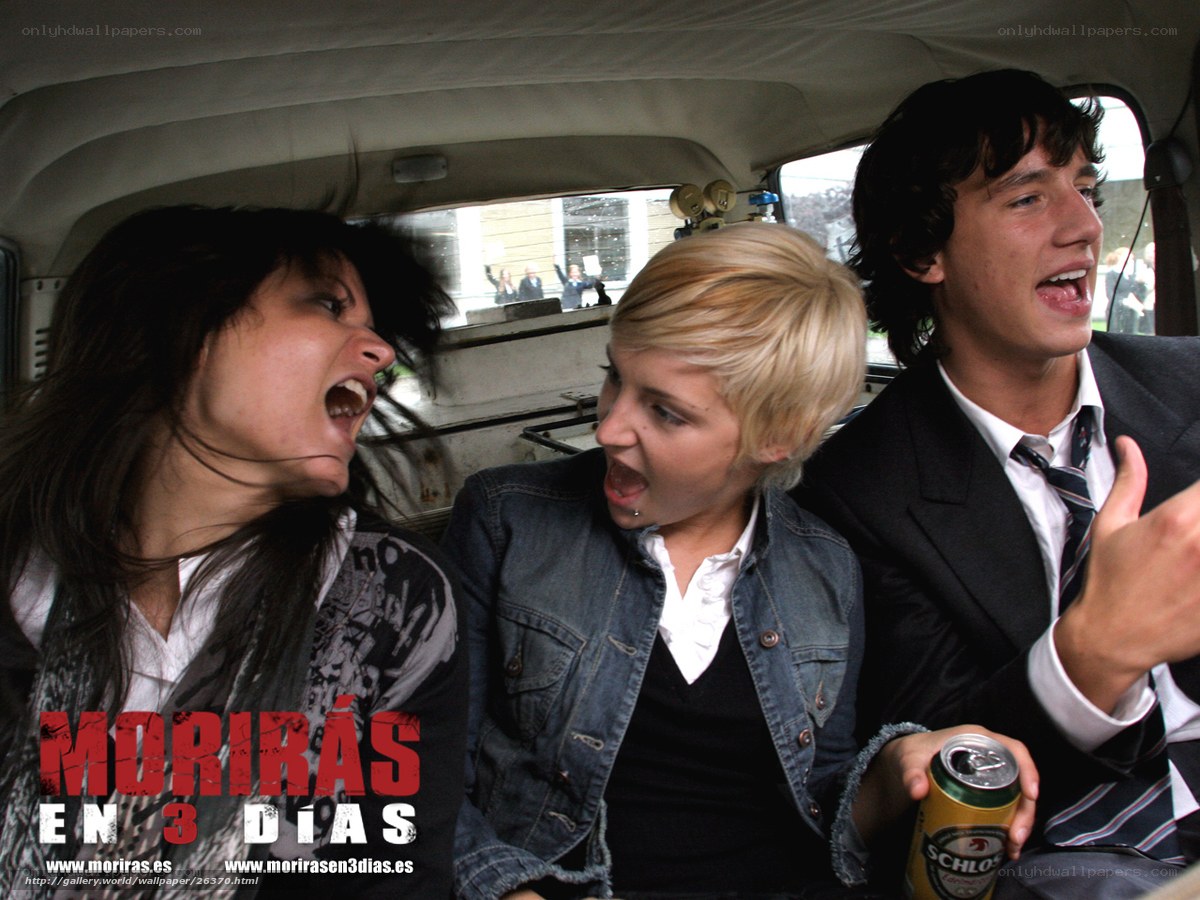 three people screaming in a car