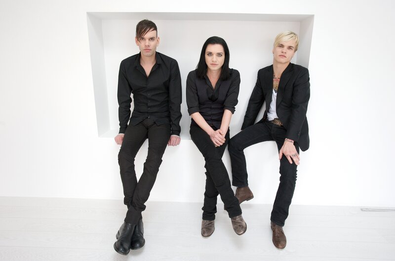 Three People Sitting — White, Neutral