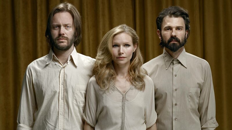 Three People Standing — Beige
