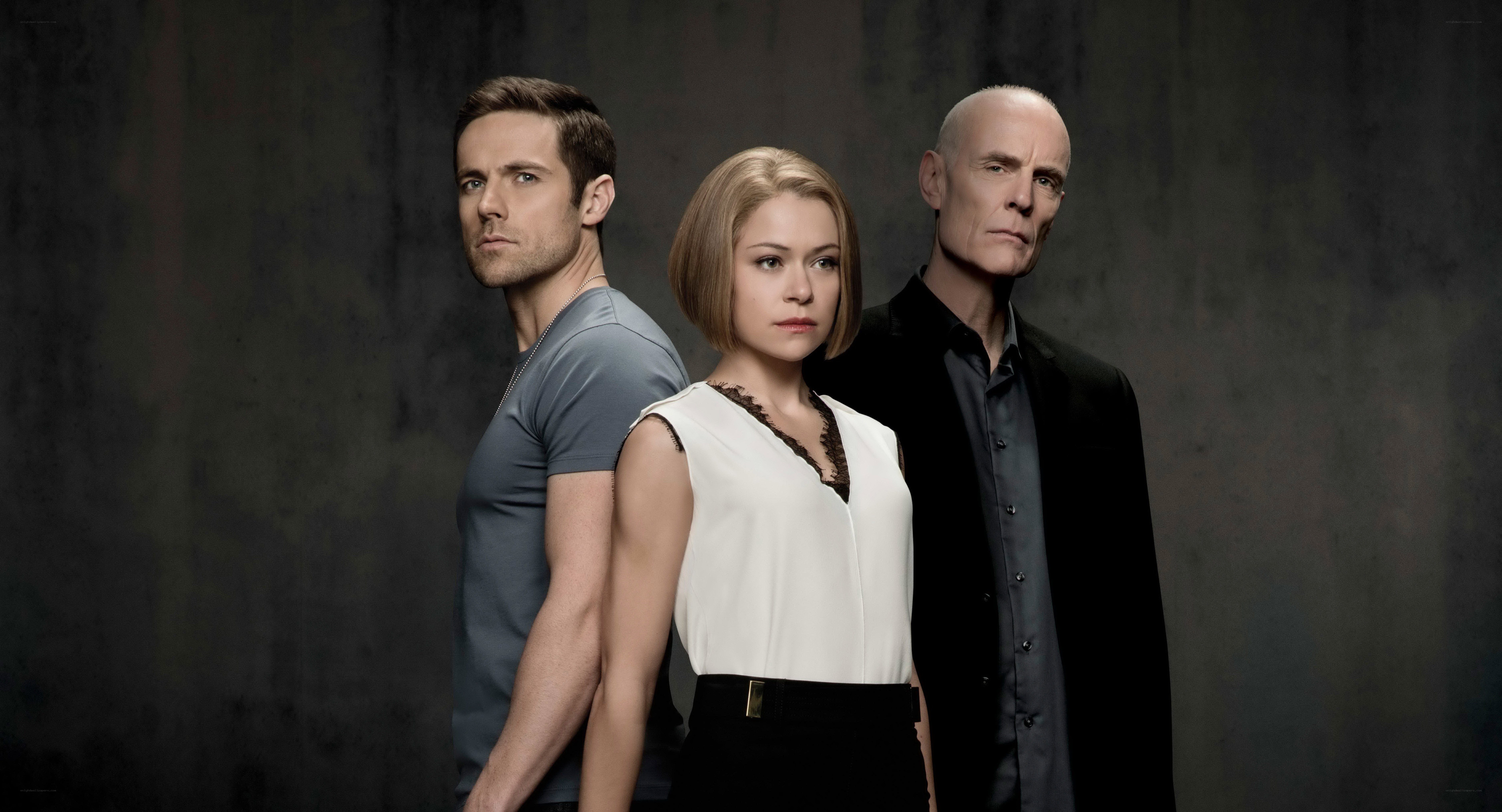 three people standing together
