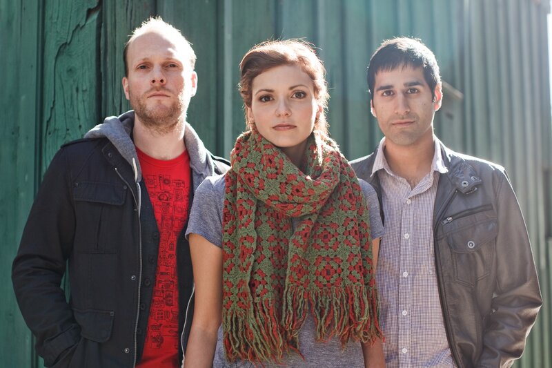three people standing together