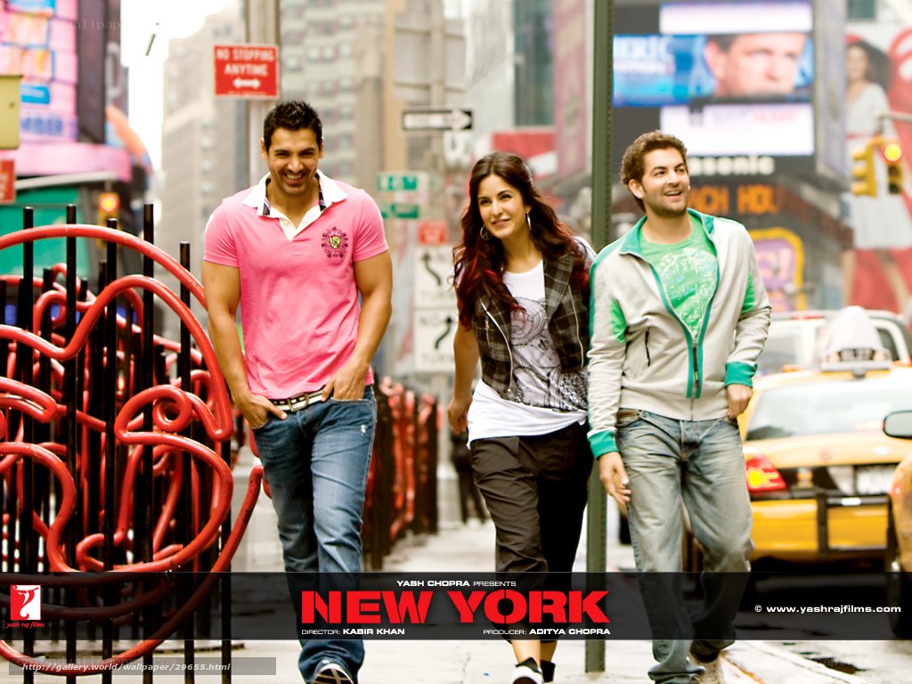 Three people walking in New York
